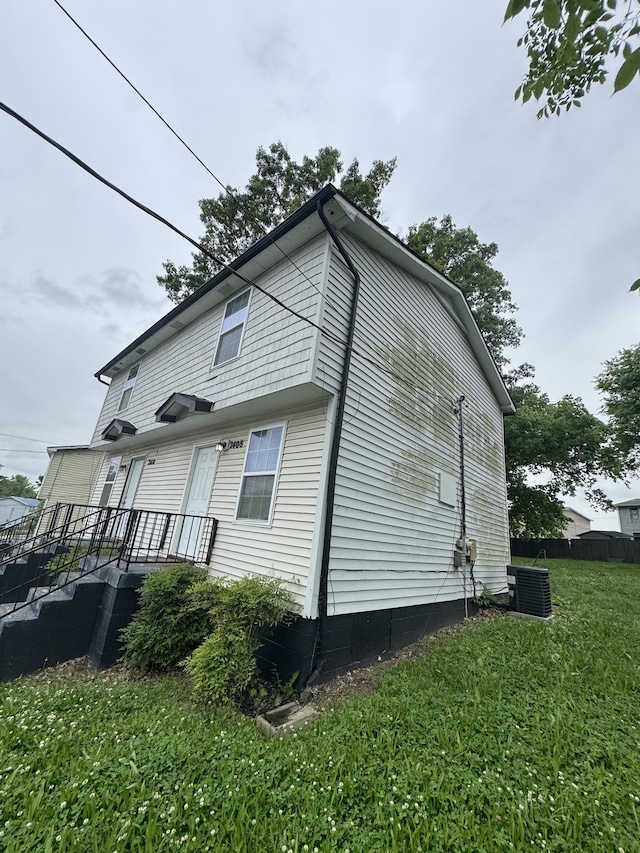 2408 Woodale Ln, Nashville, TN 37207 - view of home's exterior featuring central AC unit and a yard