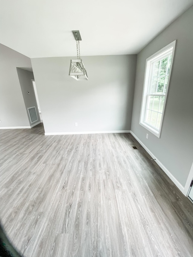 100 Wt Hardison Ave, Portland, TN 37148 - unfurnished dining area featuring wood finished floors and baseboards