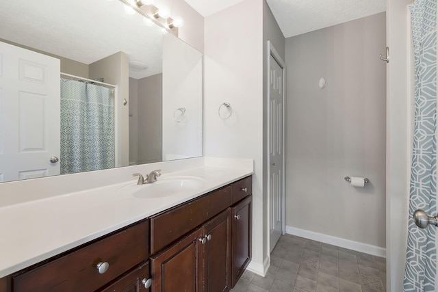 2012 Arum Ct, Spring Hill, TN 37174 - bathroom with vanity, baseboards, and a textured ceiling
