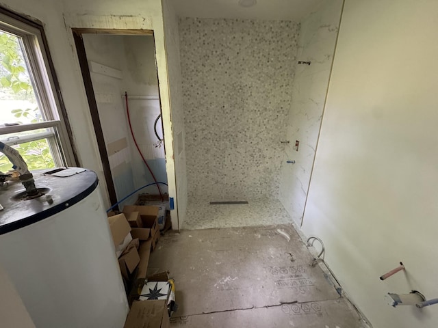 662 Happy Hollow Rd, Goodlettsville, TN 37072 - bathroom featuring walk in shower, healthy amount of natural light, and water heater