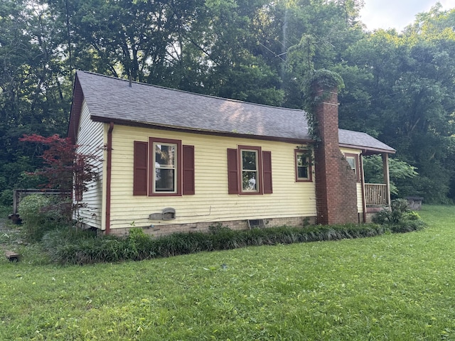 662 Happy Hollow Rd, Goodlettsville, TN 37072 - view of side of property featuring a lawn, a chimney, and roof with shingles