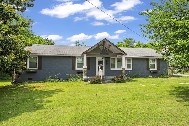 225 Nelson Dr, La Vergne, TN 37086 - view of front of property featuring brick siding, a front yard, crawl space, and a shingled roof