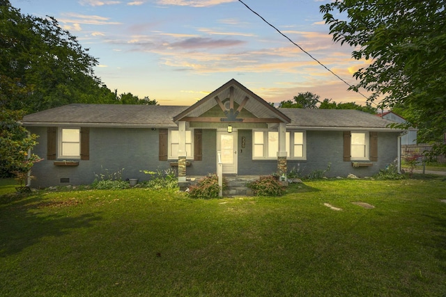 225 Nelson Dr, La Vergne, TN 37086 - view of front of house with brick siding, a lawn, crawl space, and roof with shingles