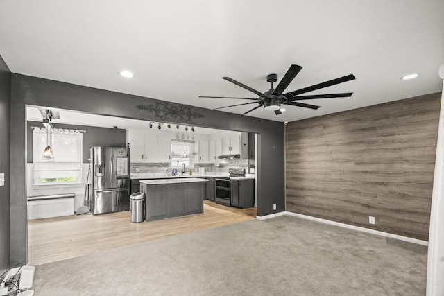 225 Nelson Dr, La Vergne, TN 37086 - kitchen featuring stainless steel appliances, open floor plan, ceiling fan, a sink, and a kitchen island