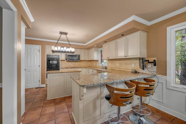 1321 Robert E Lee Ln, Brentwood, TN 37027 - kitchen with stainless steel microwave, oven, tasteful backsplash, crown molding, and light stone counters