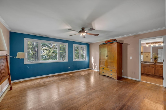1321 Robert E Lee Ln, Brentwood, TN 37027 - unfurnished bedroom featuring ornamental molding, light wood-style floors, a ceiling fan, and ensuite bath