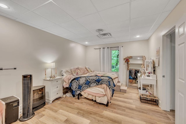 1321 Robert E Lee Ln, Brentwood, TN 37027 - bedroom featuring a drop ceiling, light wood-style flooring, a spacious closet, and recessed lighting