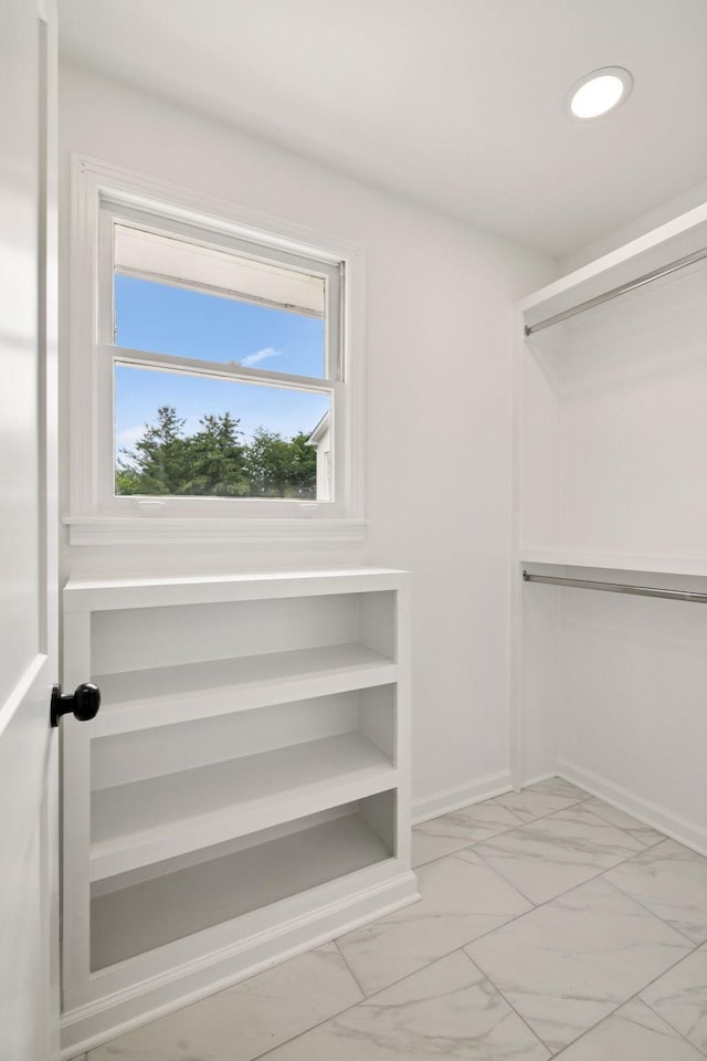 8226 Frontier Ln, Brentwood, TN 37027 - walk in closet with light marble finish floors