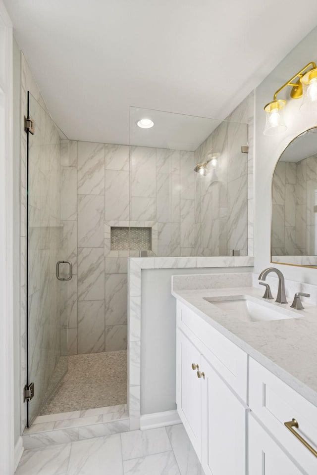 8226 Frontier Ln, Brentwood, TN 37027 - bathroom featuring marble finish floors, a shower stall, vanity, and recessed lighting