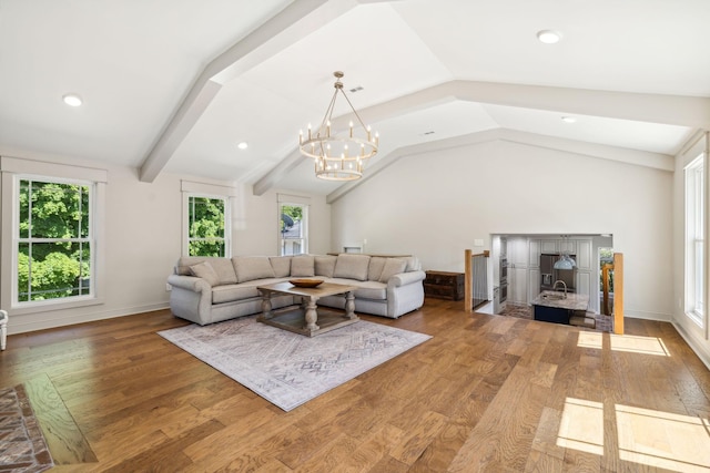 8226 Frontier Ln, Brentwood, TN 37027 - living room with vaulted ceiling, plenty of natural light, light wood-style flooring, a chandelier, and recessed lighting