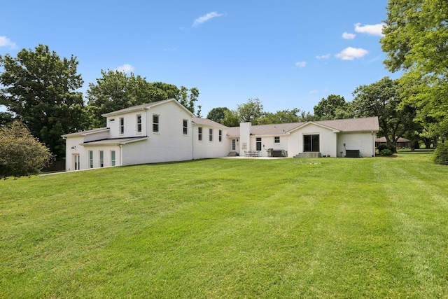 8226 Frontier Ln, Brentwood, TN 37027 - back of house with a lawn, a patio, and a chimney