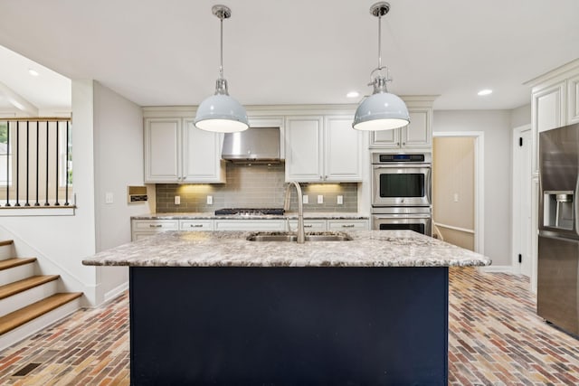 8226 Frontier Ln, Brentwood, TN 37027 - kitchen with appliances with stainless steel finishes, a sink, brick floors, baseboards, and recessed lighting