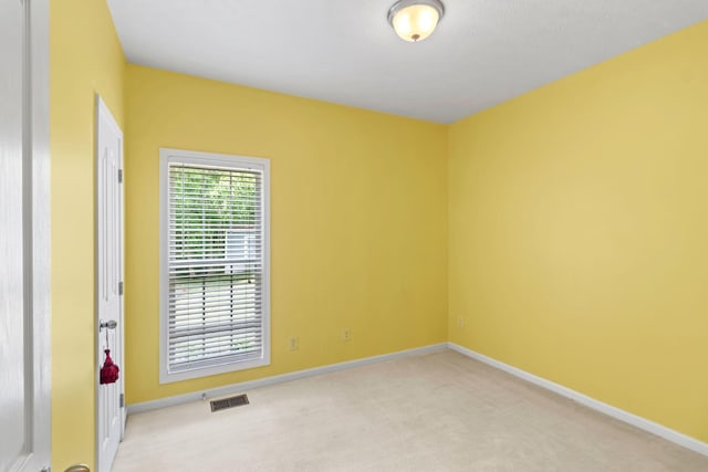 1166 Ben Hill Blvd, Nolensville, TN 37135 - spare room featuring light carpet and baseboards