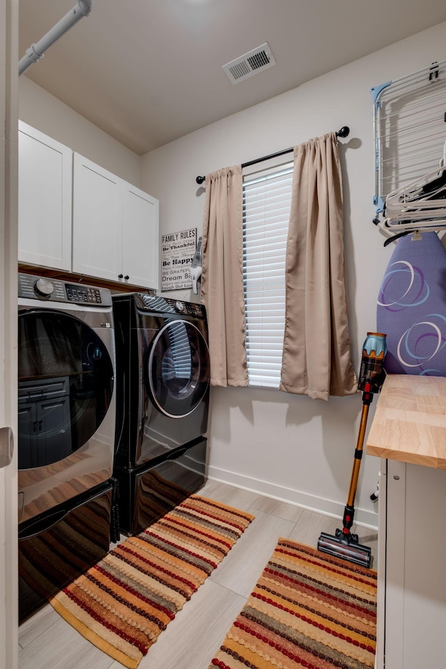1605 Medinah Ln, Lebanon, TN 37087 - washroom with cabinet space and separate washer and dryer
