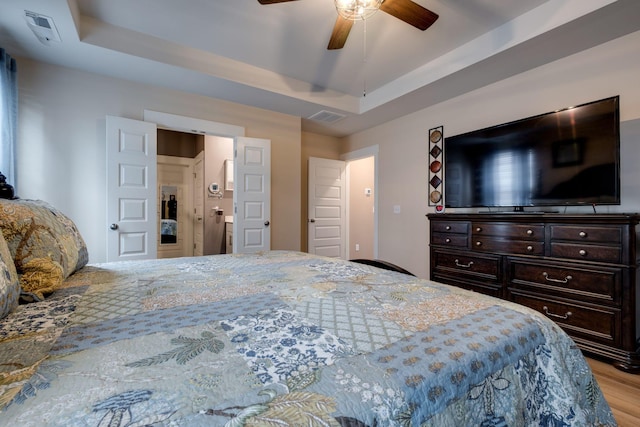 1605 Medinah Ln, Lebanon, TN 37087 - bedroom with wood finished floors, a raised ceiling, and ceiling fan