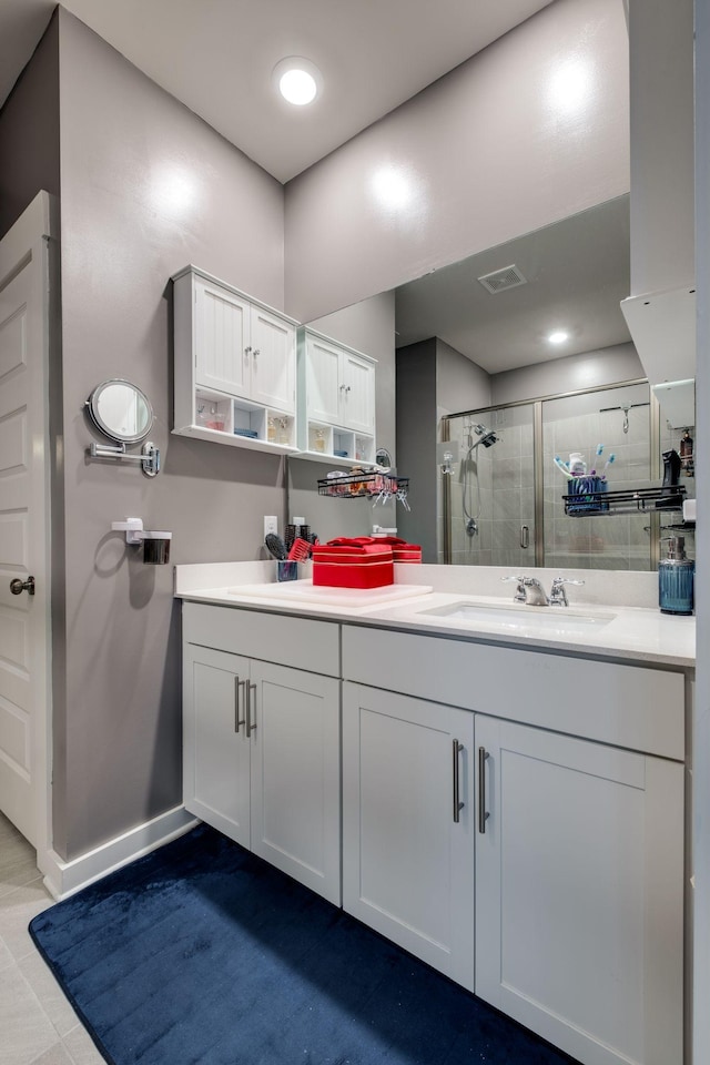 1605 Medinah Ln, Lebanon, TN 37087 - bathroom with double vanity, a stall shower, and tile patterned floors