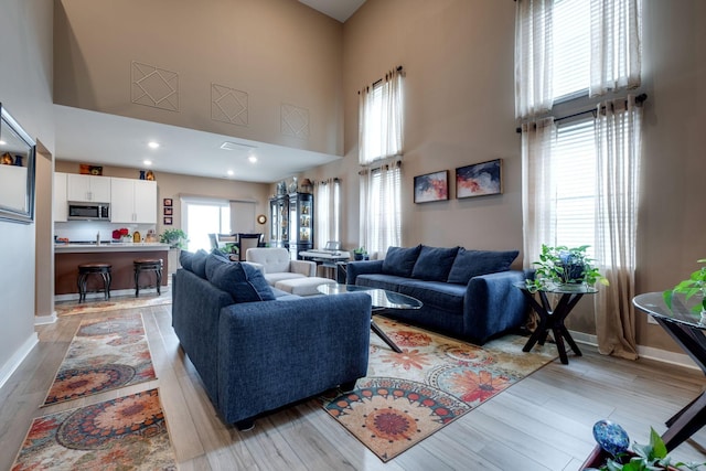 1605 Medinah Ln, Lebanon, TN 37087 - living room with a towering ceiling and light wood-style flooring