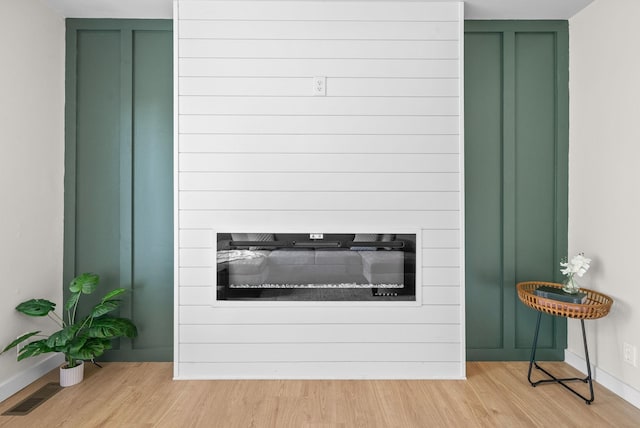 415 Jordan Rd, Clarksville, TN 37042 - detailed view of wood finished floors and a glass covered fireplace