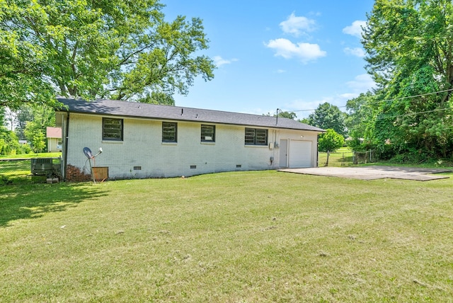 415 Jordan Rd, Clarksville, TN 37042 - back of house with crawl space, an attached garage, brick siding, and concrete driveway