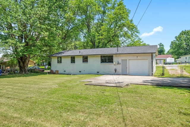415 Jordan Rd, Clarksville, TN 37042 - rear view of property featuring crawl space, driveway, an attached garage, a patio, and brick siding