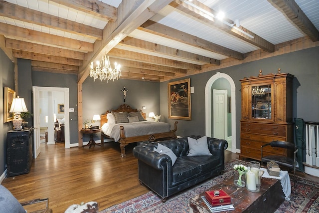 1105 Mount Pleasant Rd, Kingston Springs, TN 37082 - bedroom with wood finished floors, arched walkways, a chandelier, baseboards, and wooden ceiling with exposed beams