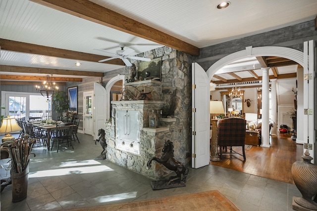 1105 Mount Pleasant Rd, Kingston Springs, TN 37082 - entrance foyer with arched walkways, a chandelier, decorative columns, beam ceiling, and ceiling fan