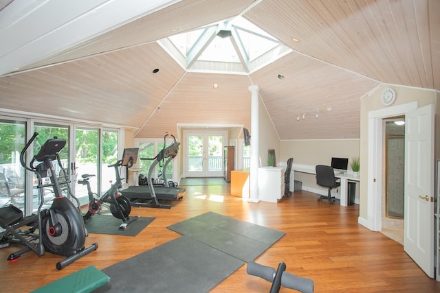 1105 Mount Pleasant Rd, Kingston Springs, TN 37082 - exercise room featuring lofted ceiling, a skylight, wood ceiling, wood finished floors, and french doors