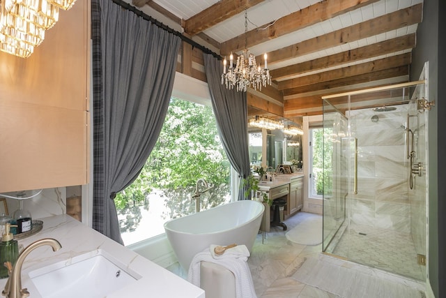 1105 Mount Pleasant Rd, Kingston Springs, TN 37082 - full bathroom with a chandelier, double vanity, a stall shower, a freestanding bath, and healthy amount of natural light