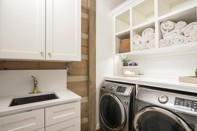 1105 Mount Pleasant Rd, Kingston Springs, TN 37082 - laundry area featuring cabinet space and washing machine and dryer