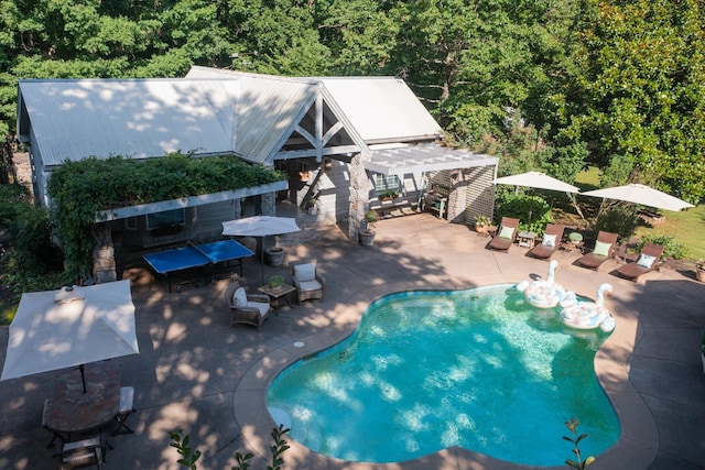 1105 Mount Pleasant Rd, Kingston Springs, TN 37082 - outdoor pool featuring a patio, a pergola, and a wooded view
