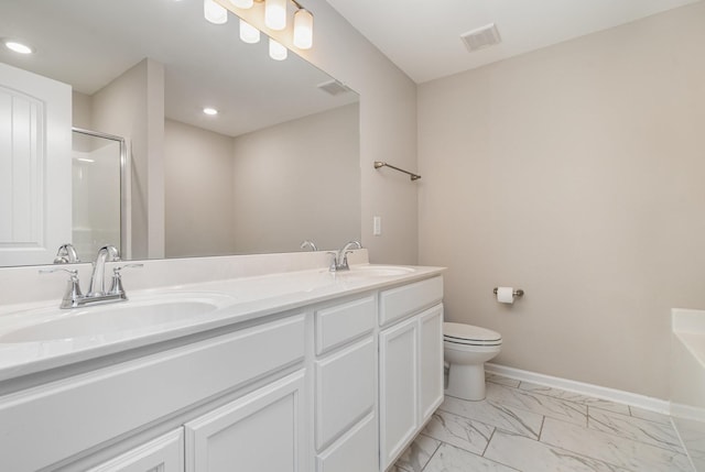 142 Rising Pvt Ln, Gallatin, TN 37066 - bathroom featuring marble finish flooring, double vanity, toilet, baseboards, and a shower with door