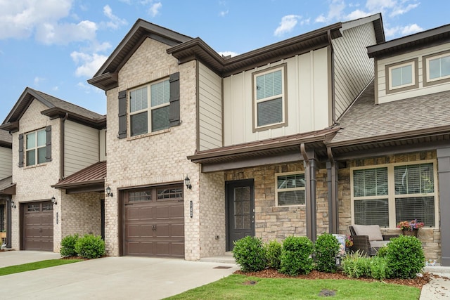 142 Rising Pvt Ln, Gallatin, TN 37066 - multi unit property featuring board and batten siding, a garage, driveway, and stone siding