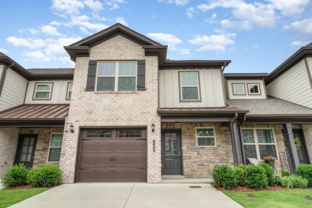 142 Rising Pvt Ln, Gallatin, TN 37066 - townhome / multi-family property with driveway, stone siding, an attached garage, and board and batten siding