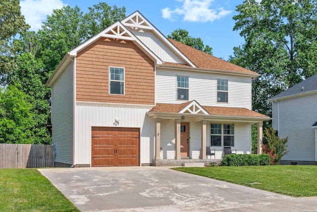 1341 Sussex Dr, Clarksville, TN 37042 - view of front of house with a porch, an attached garage, driveway, roof with shingles, and board and batten siding