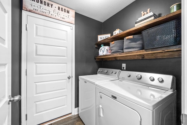 1341 Sussex Dr, Clarksville, TN 37042 - washroom with washer and dryer, dark wood-style floors, and a textured ceiling