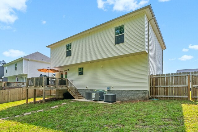 1341 Sussex Dr, Clarksville, TN 37042 - rear view of house featuring a wooden deck, central AC, and stairs