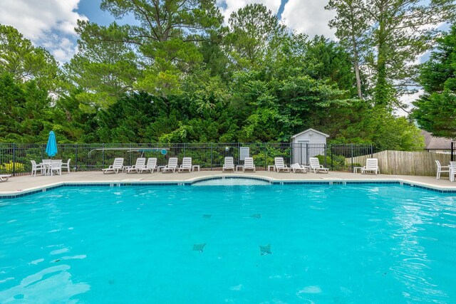 4370 Wellesley Dr, Ooltewah, TN 37363 - community pool featuring a patio