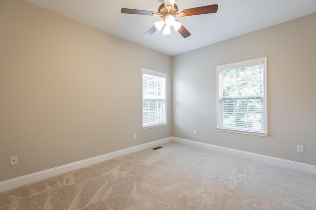4370 Wellesley Dr, Ooltewah, TN 37363 - spare room with light colored carpet, baseboards, and ceiling fan