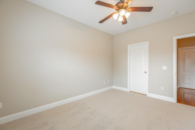 4370 Wellesley Dr, Ooltewah, TN 37363 - unfurnished bedroom featuring baseboards, carpet flooring, and a ceiling fan