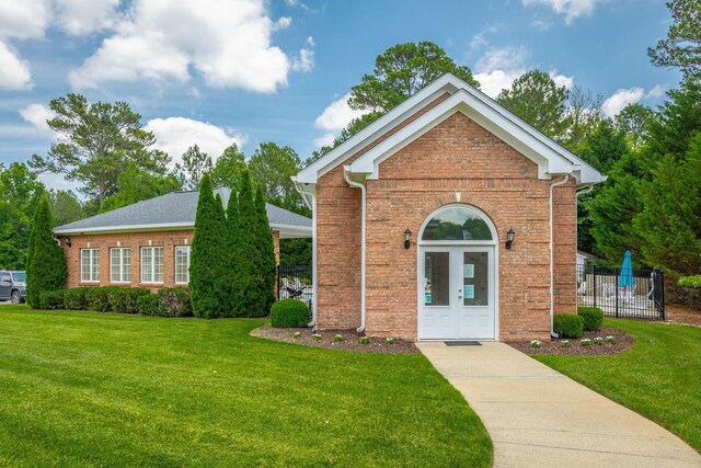 4370 Wellesley Dr, Ooltewah, TN 37363 - traditional-style house featuring brick siding and french doors