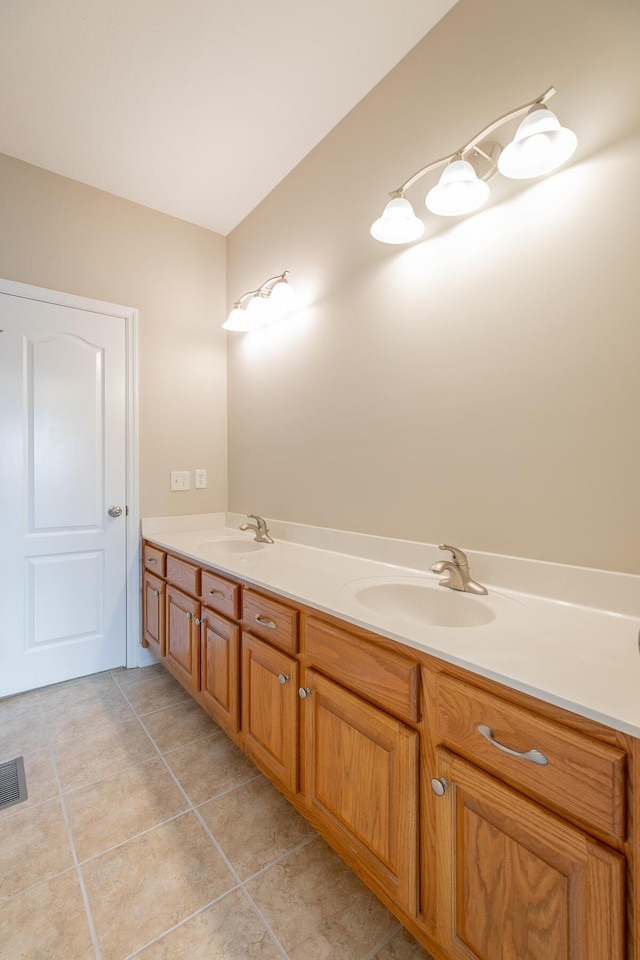 4370 Wellesley Dr, Ooltewah, TN 37363 - bathroom featuring double vanity and tile patterned floors