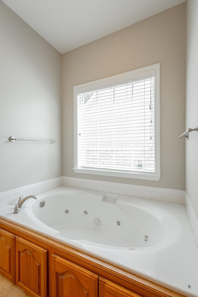 4370 Wellesley Dr, Ooltewah, TN 37363 - full bath with healthy amount of natural light and a jetted tub