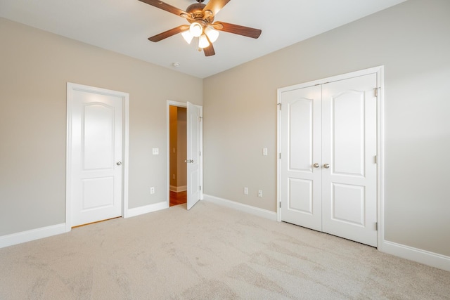 4370 Wellesley Dr, Ooltewah, TN 37363 - unfurnished bedroom with carpet, baseboards, a ceiling fan, and a closet