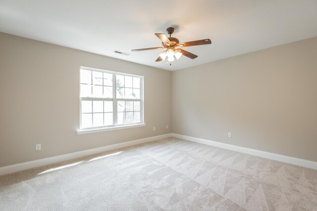 4370 Wellesley Dr, Ooltewah, TN 37363 - empty room featuring a ceiling fan, light carpet, and baseboards
