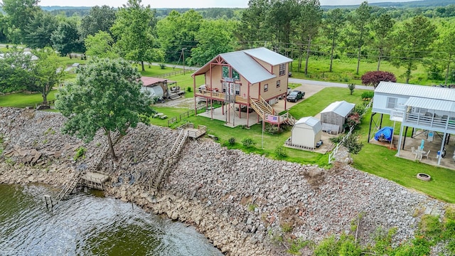230 Silver Water Ln, Counce, TN 38326 - aerial view of property and surrounding area with a nearby body of water and a forest