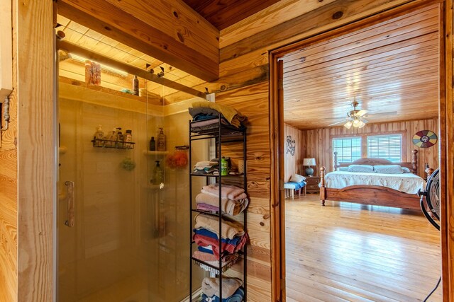 230 Silver Water Ln, Counce, TN 38326 - bedroom featuring wood ceiling, wooden walls, and wood finished floors