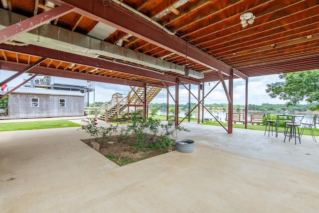 230 Silver Water Ln, Counce, TN 38326 - view of patio featuring stairs and a water view