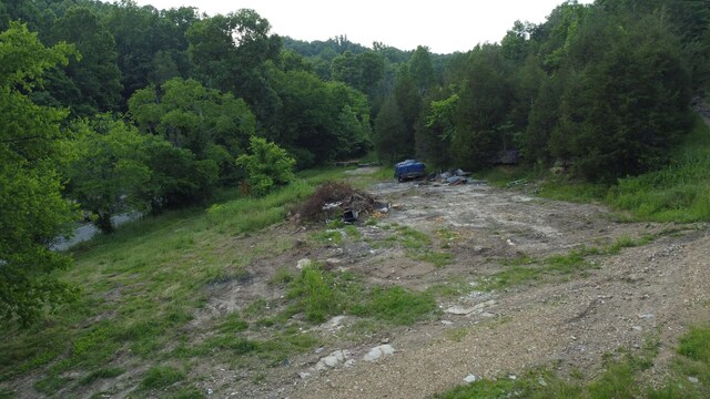 738 Rogues Fork Rd, Bethpage, TN 37022 - aerial view of property and surrounding area with a heavily wooded area