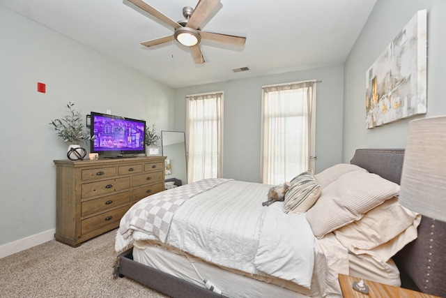 817 3rd Ave N Unit 411, Nashville, TN 37201 - bedroom with carpet, baseboards, and a ceiling fan
