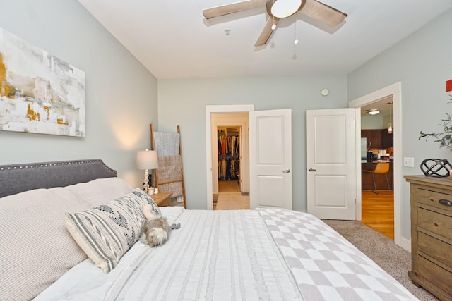 817 3rd Ave N Unit 411, Nashville, TN 37201 - bedroom with a walk in closet, carpet flooring, a ceiling fan, and a closet